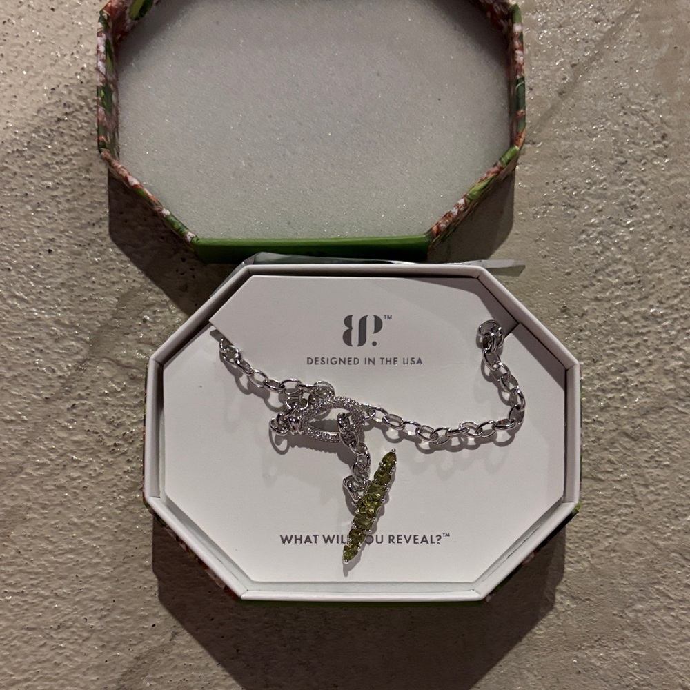 Silver necklace with Green Charm